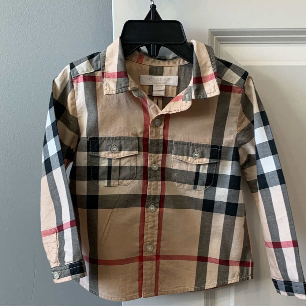 Authentic kids but very shirt .